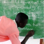 Students do mathematic exercises on the board