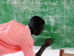 Students do mathematic exercises on the board