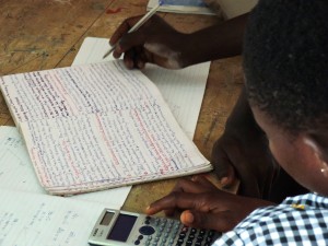 Students go over their written work