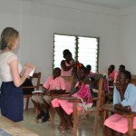 Summer intern Ellie Sell introduces students to science day