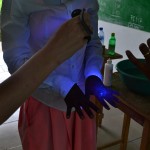 Students experiment with glow in the dark substance