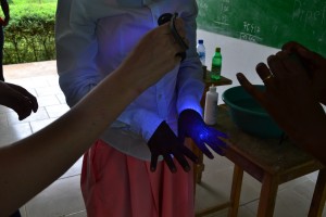 Students experiment with glow in the dark substance