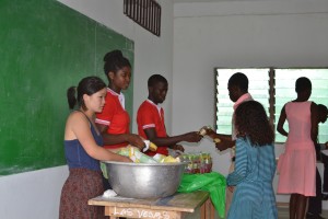 Summer intern Julie Chen passes out drinks and snacks